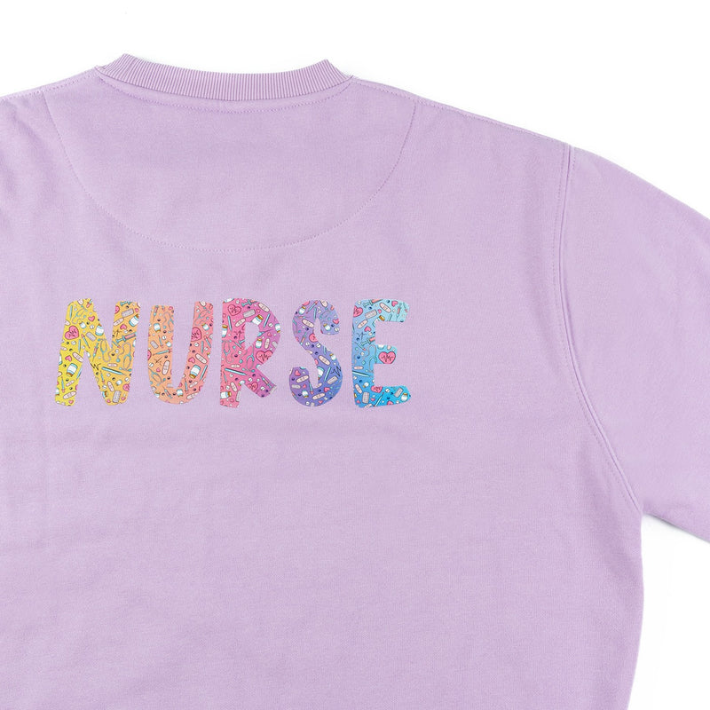 Lavender sweatshirt with a medical print.-zoom-