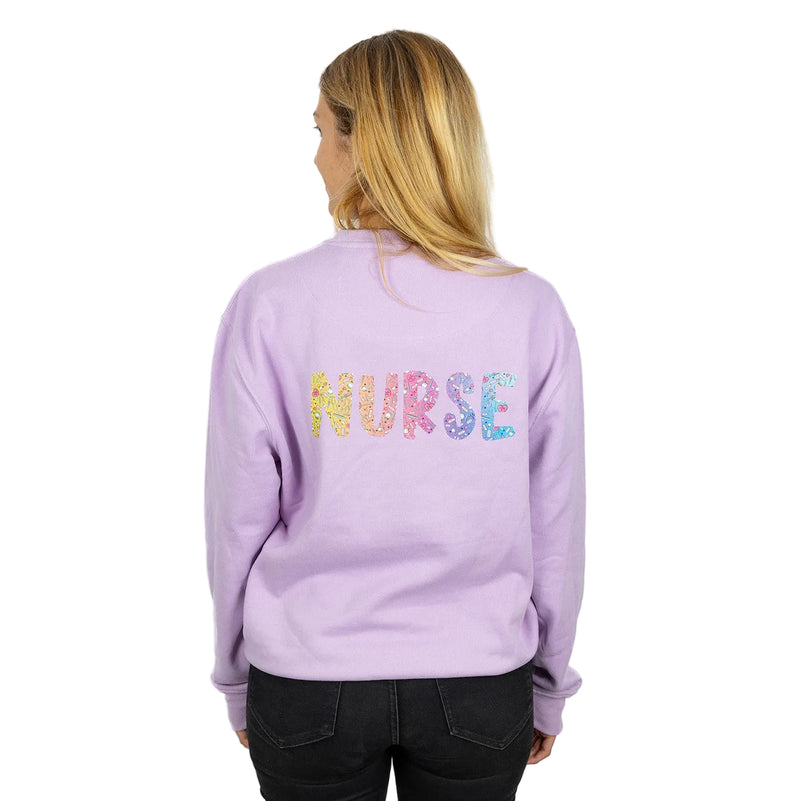 Lavender sweatshirt with a medical print.-zoom-